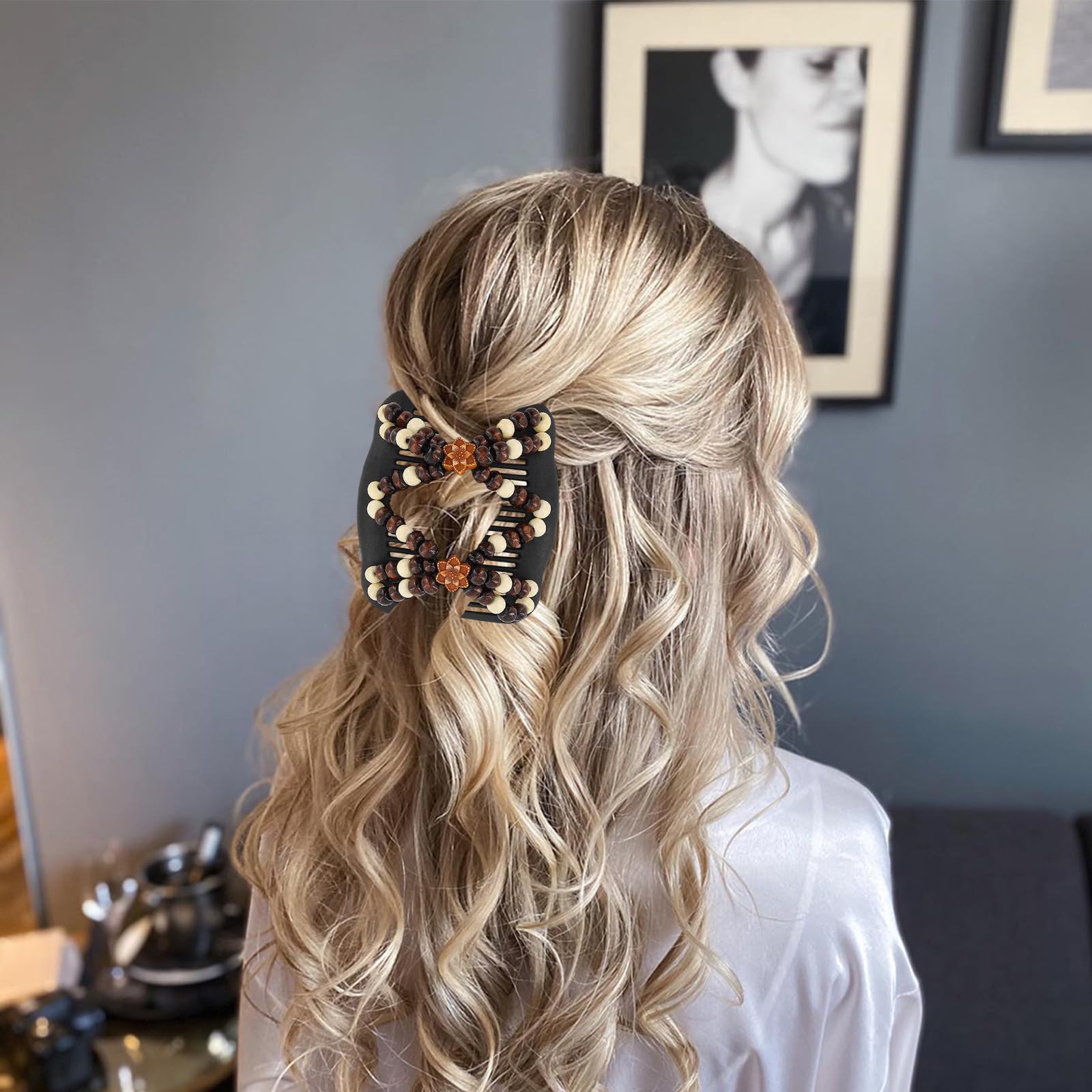Suptizizkz bun-styling with double comb clips creating a neat updo