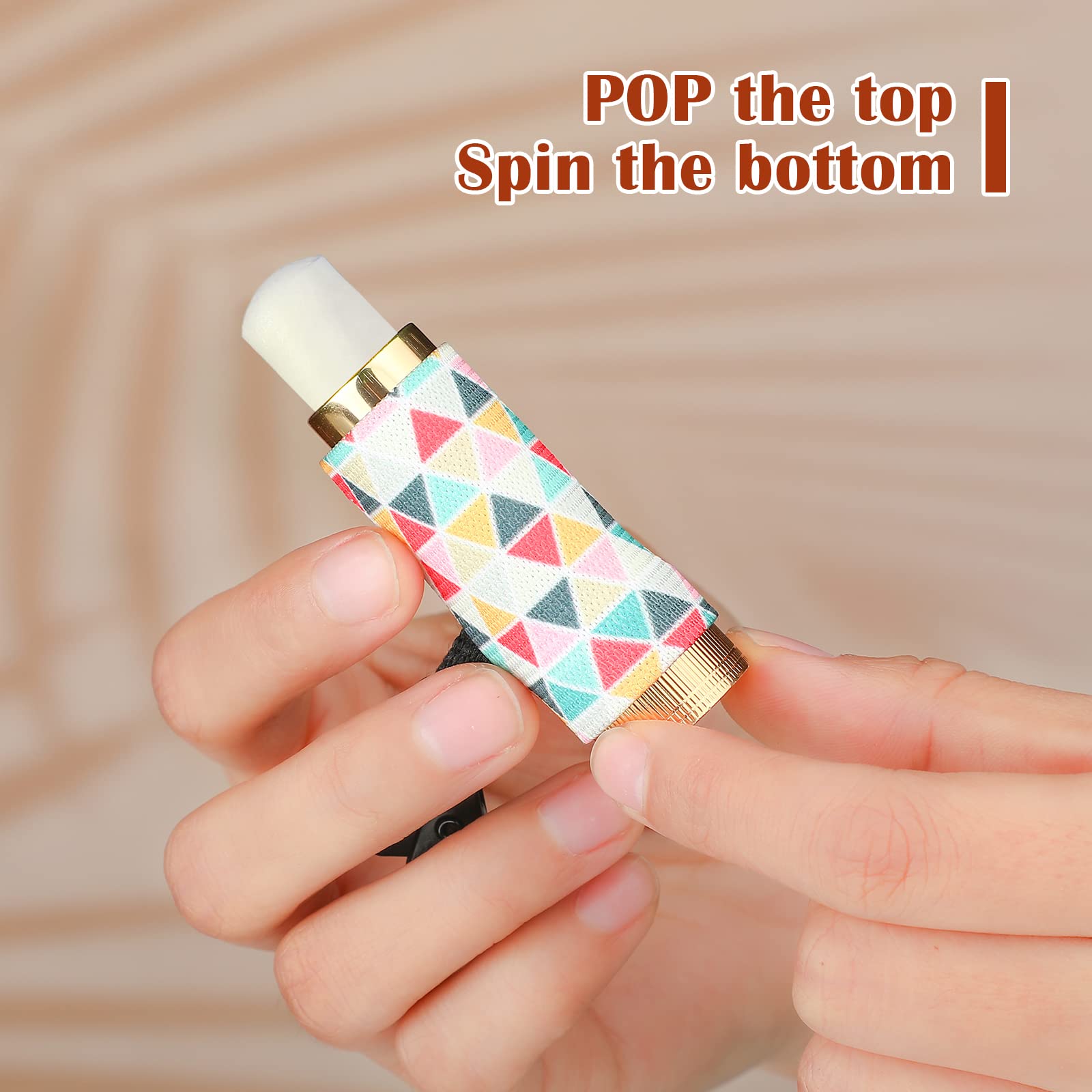 Set of 10 floral lip balm holders arranged for display