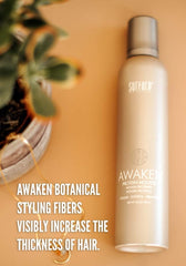 Surface Awaken Mousse foam on hand demonstrates light hold