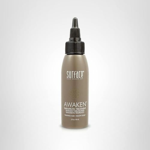 Surface Awaken Therapeutic Treatment in use by a user with a calm, healthy-looking scalp.