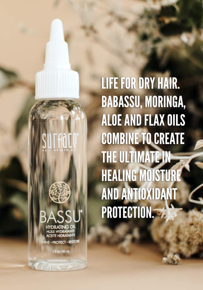 Pouring Bassu Hydrating Oil to illustrate quick absorption and hydration