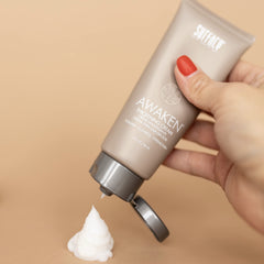Close-up of SURFACE Hair Awaken Thickening Cream texture on hair
