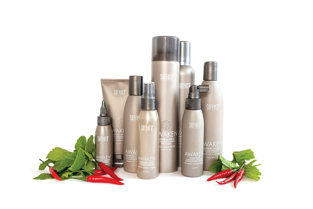 Surface Hair Awaken pour demonstrating luxurious lather and nutrient delivery.