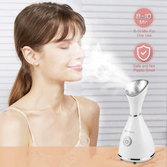 Surwit GETANYE steamer dispensing fine mist for facial hydration.