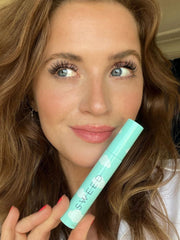 Sweed Cloud Mascara in action on lashes for a fan-like look.