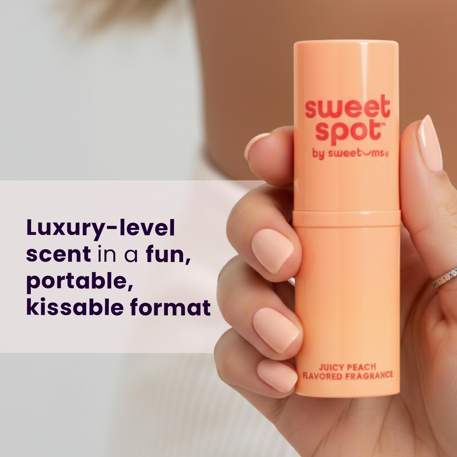 Sweetums SweetSpot Peach perfume on pulse point for subtle fragrance