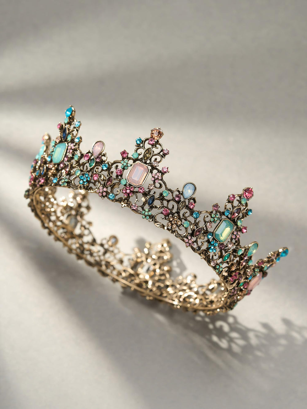 Model wearing SWEETV crown for cosplay or formal event.