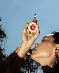 Layali Rouge label close-up, premium branding for a luxury fragrance.