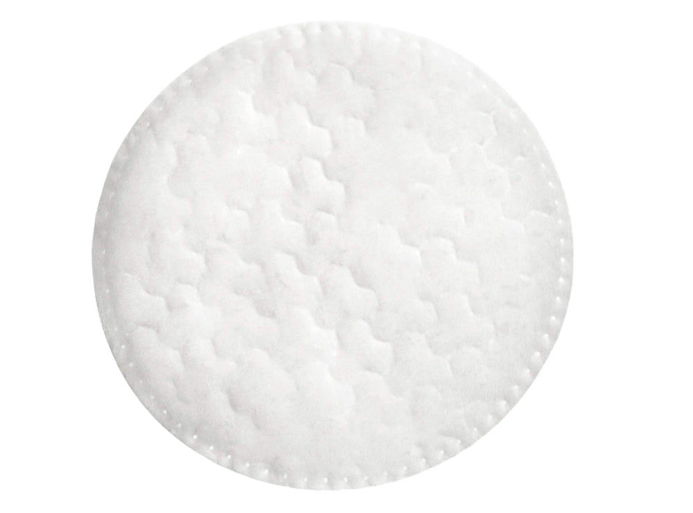 Swisspers Premium Cotton Rounds lint-reduction embossed surface for fragrance-free, gentle makeup removal.