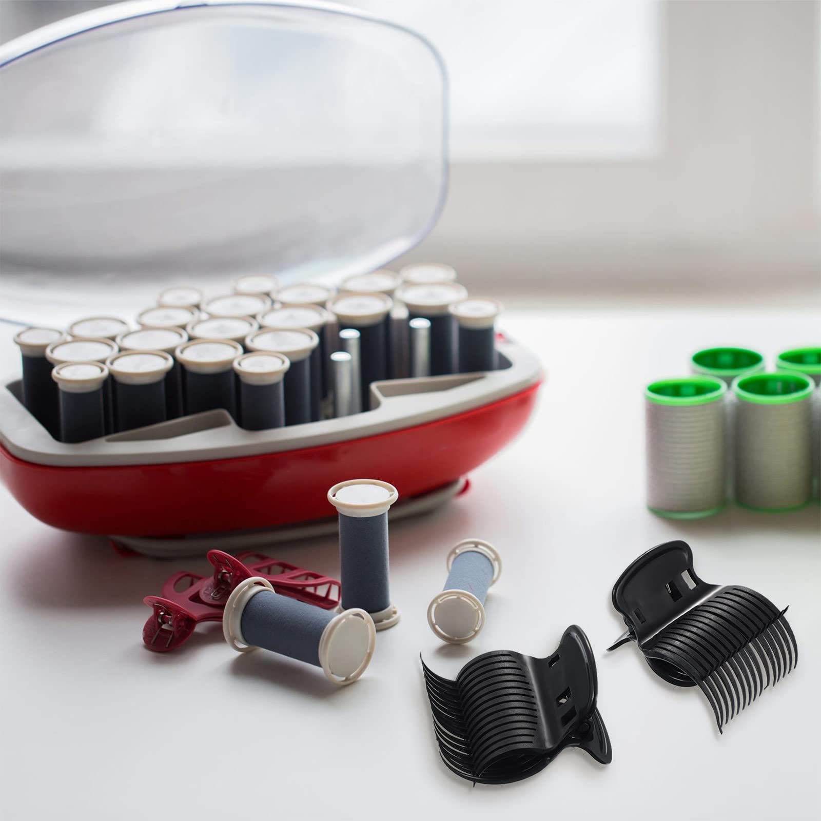 Syhood heat-resistant clip works with hot or cold rollers.