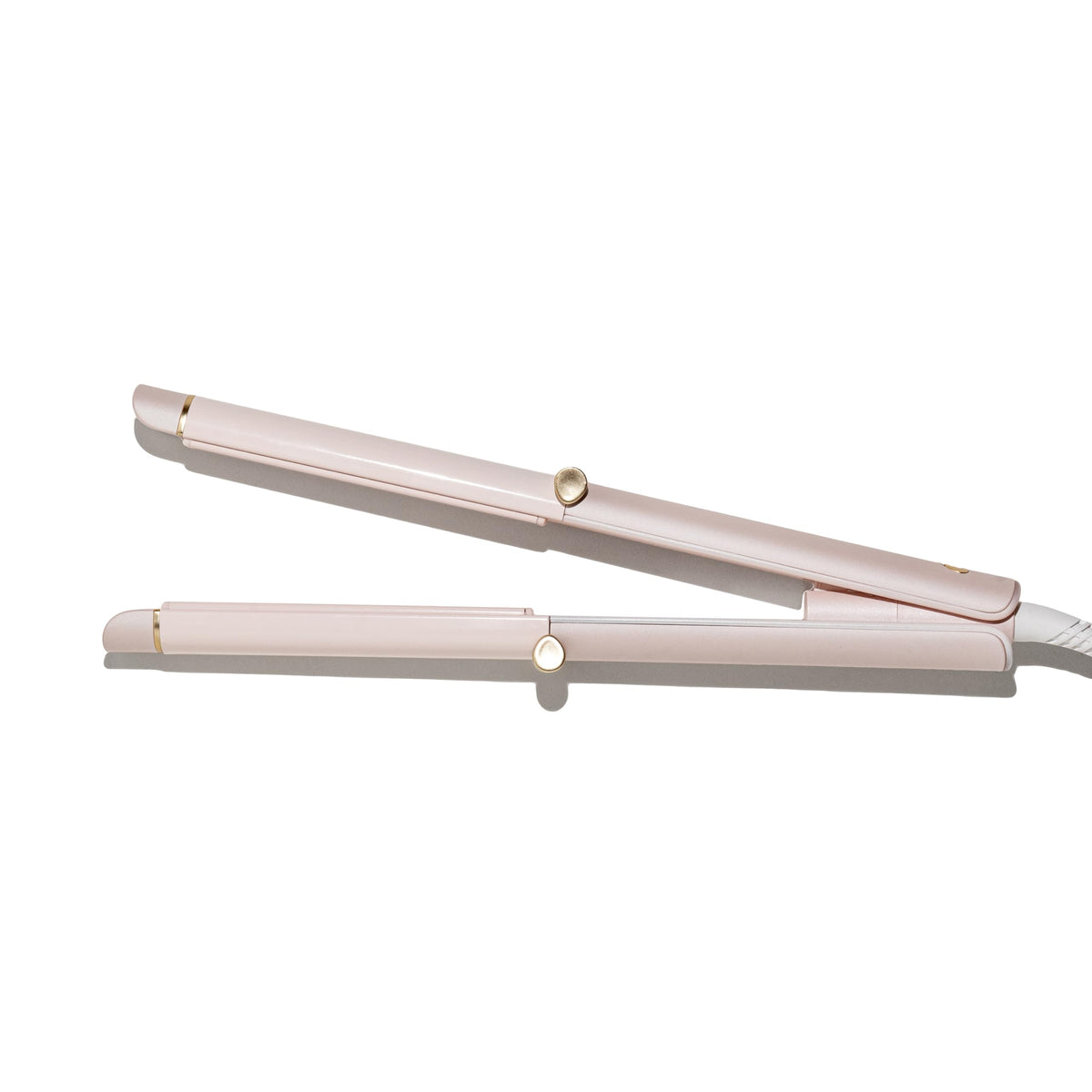 T3 Curling Straightener satin blush front view enables quick straightening or curling at home.
