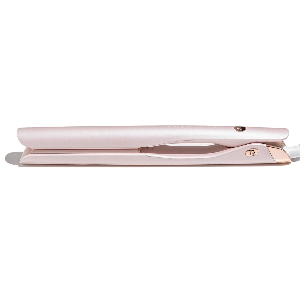 Ergonomic, snag-free glide highlighted on the T3 flat iron.