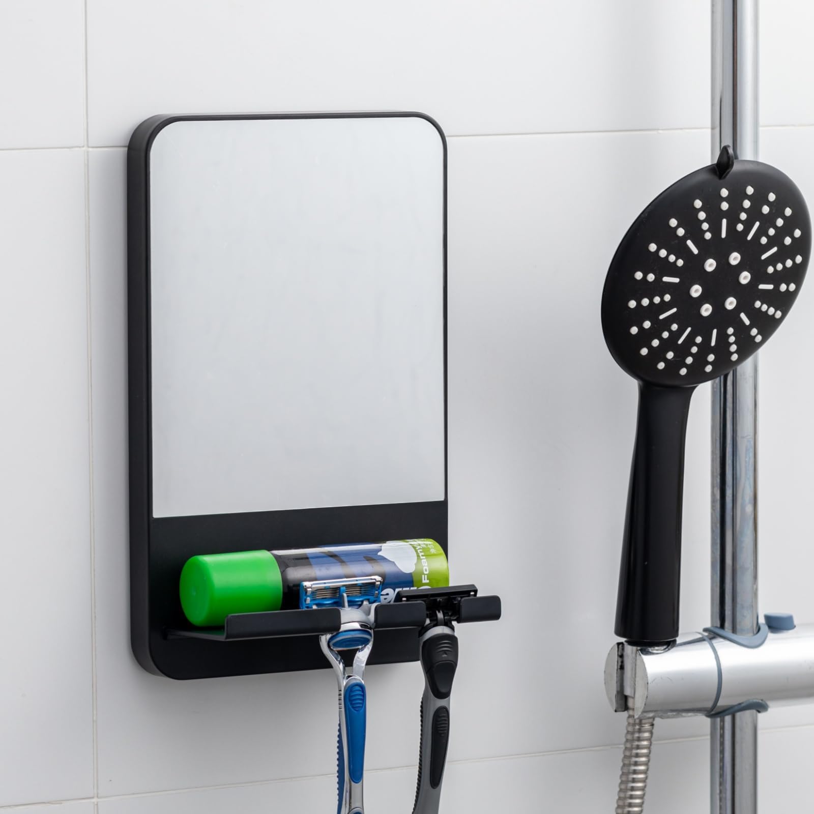 TAILI fogless shower mirror with suction cup for fog-free shaving in the shower.
