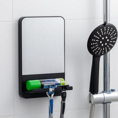 TAILI fogless shower mirror with suction cup for fog-free shaving in the shower.