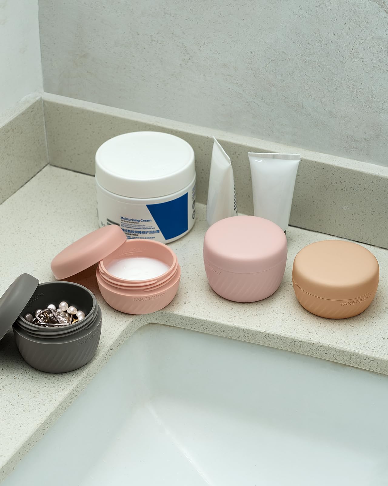 TakeToday multipurpose travel containers hold creams, serums, pills and jewelry.