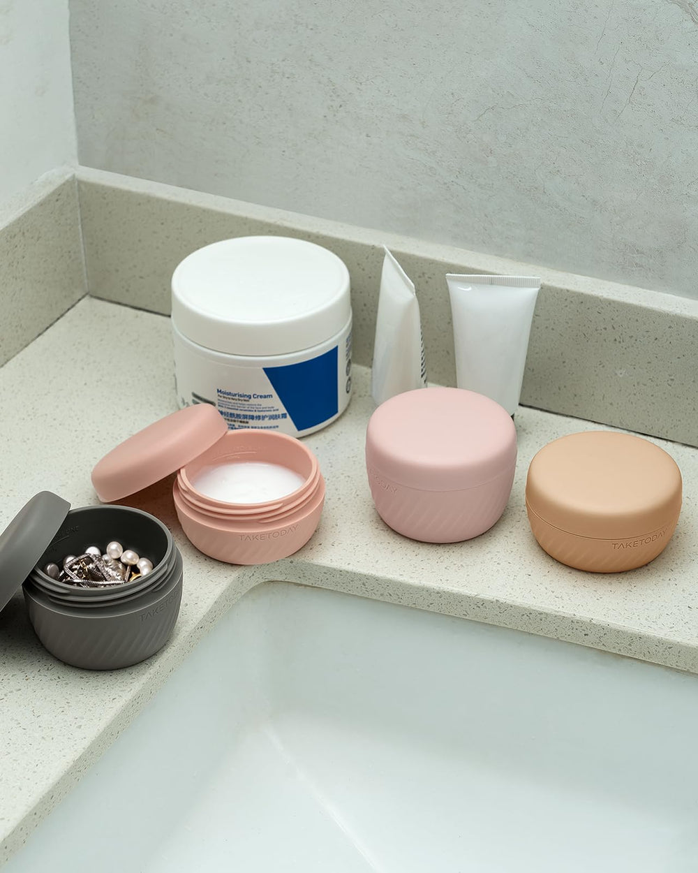 TakeToday multipurpose travel containers hold creams, serums, pills and jewelry.