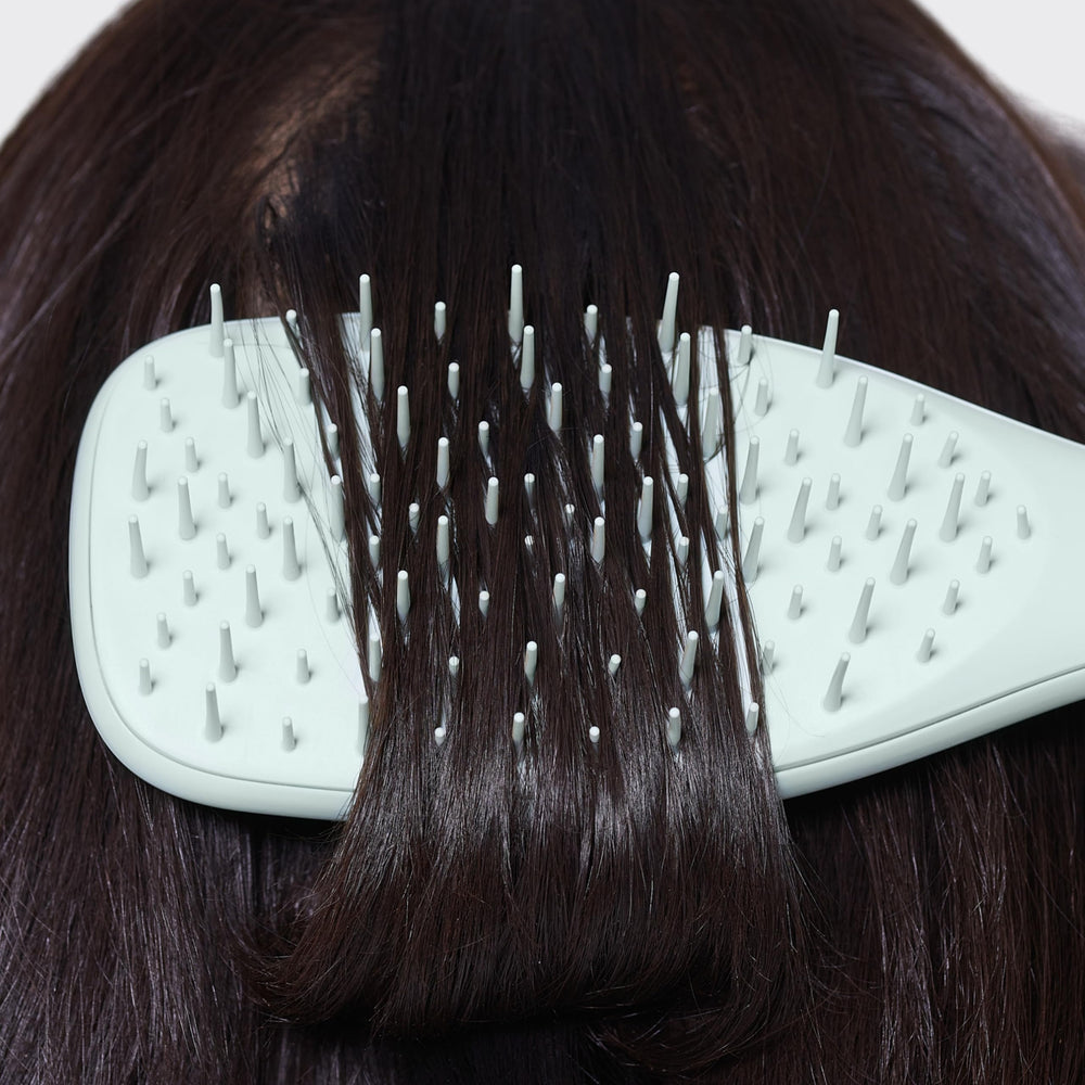 Tangle Teezer Extra Gentle Detangler compact design supports travel-friendly detangling.