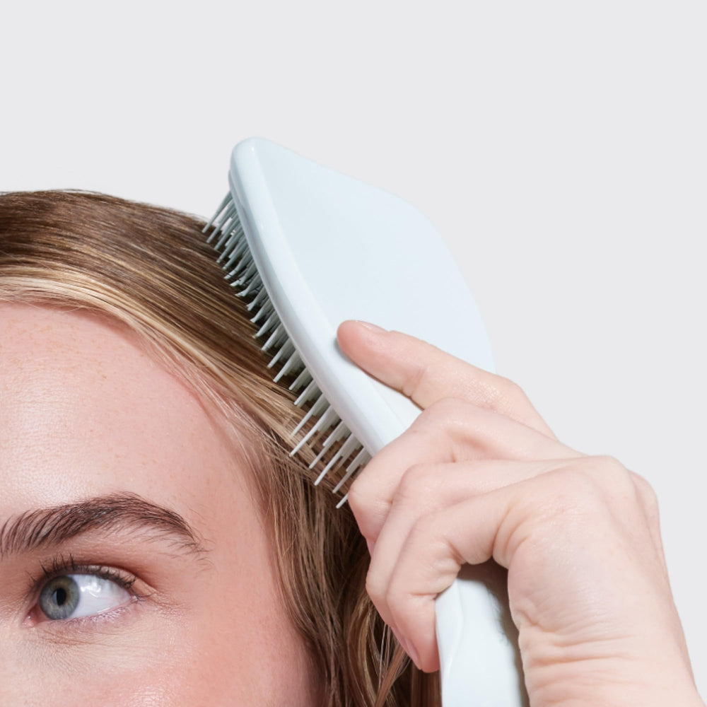 Tangle Teezer seafoam blue brush ideal for shower routines.