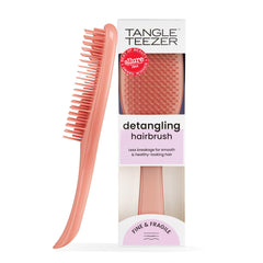 Tangle Teezer Fine Ultimate Detangler teeth close-up for gentle knot removal on fine hair.