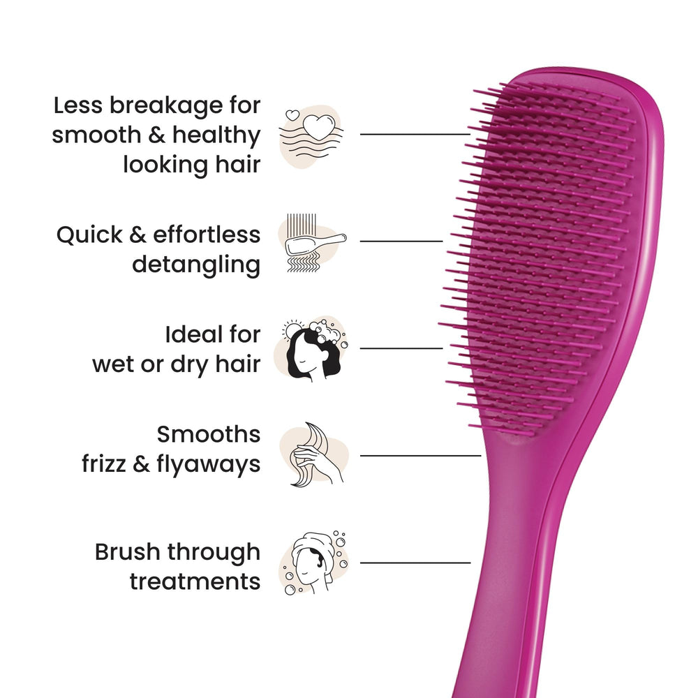 Tangle Teezer gentle detangler gliding through scalp with no tug.