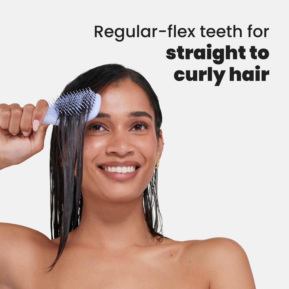 Tangle Teezer kid-friendly mini brush ideal for small hands and easy use.