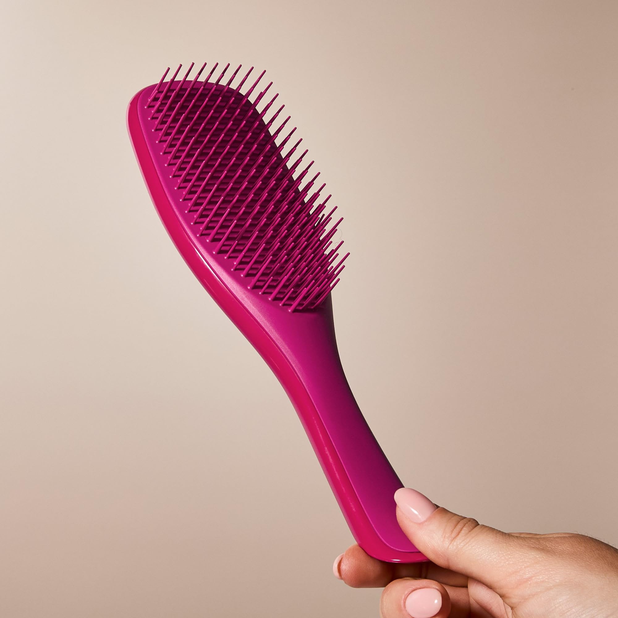Tangle Teezer knot removal enables easy glide.