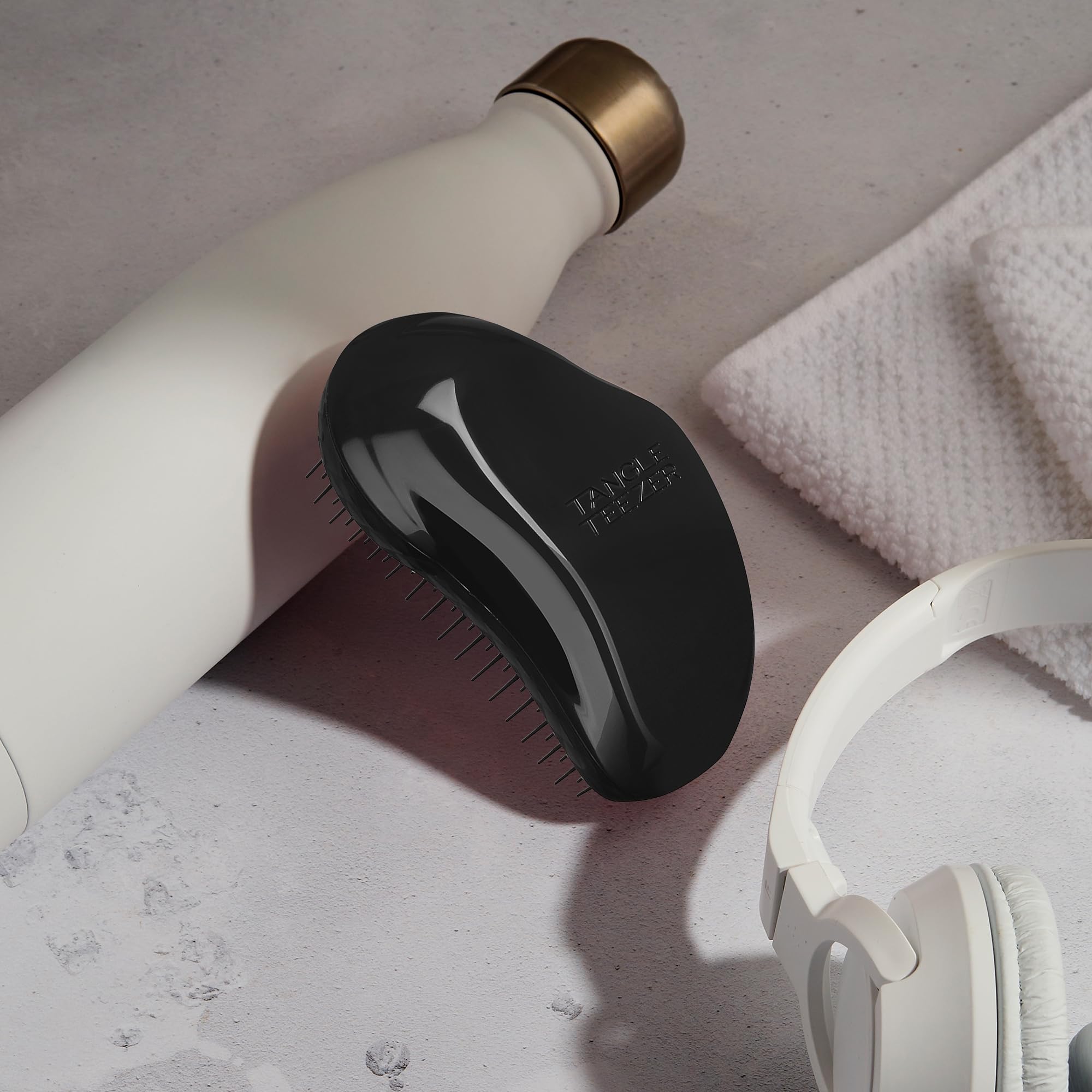 Tangle Teezer Original Detangler Panther Black in use on dry hair for knot release