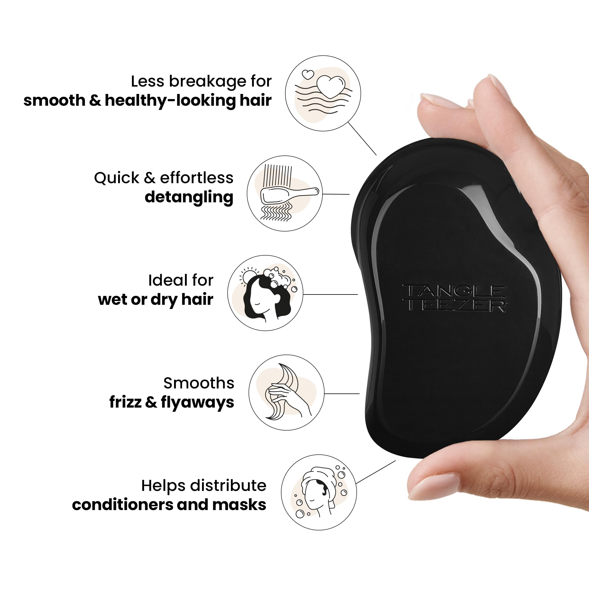 Tangle Teezer Original Detangler Panther Black in use on wet hair for even product distribution