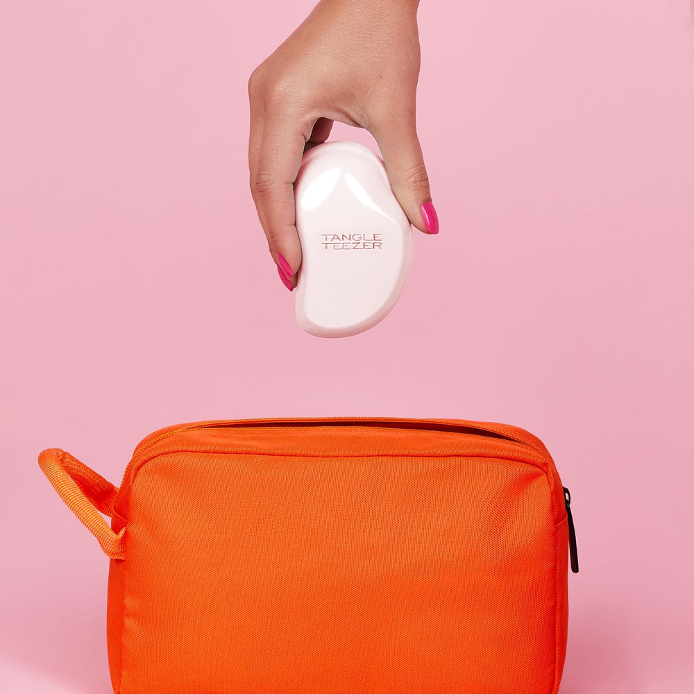 Tangle Teezer two-tier teeth detangler for fast knot removal.