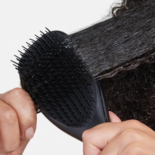 Tangle Teezer compact design travels easily for curly routines