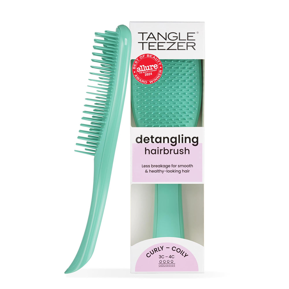 Tangle Teezer Ultimate Detangler shows curved teeth easing curly detangling