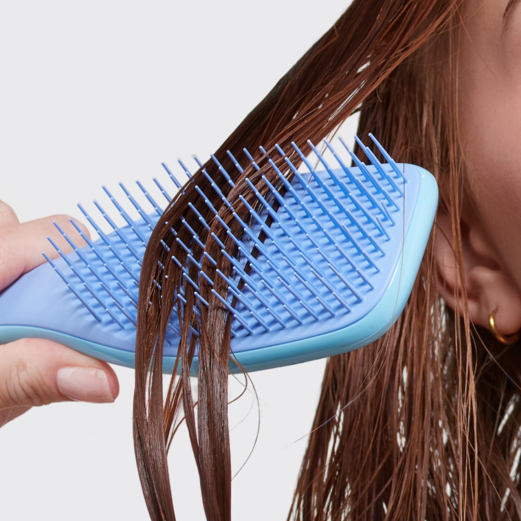 Tangle Teezer Ultimate Detangler denim blues lifestyle bathroom setup for daily care