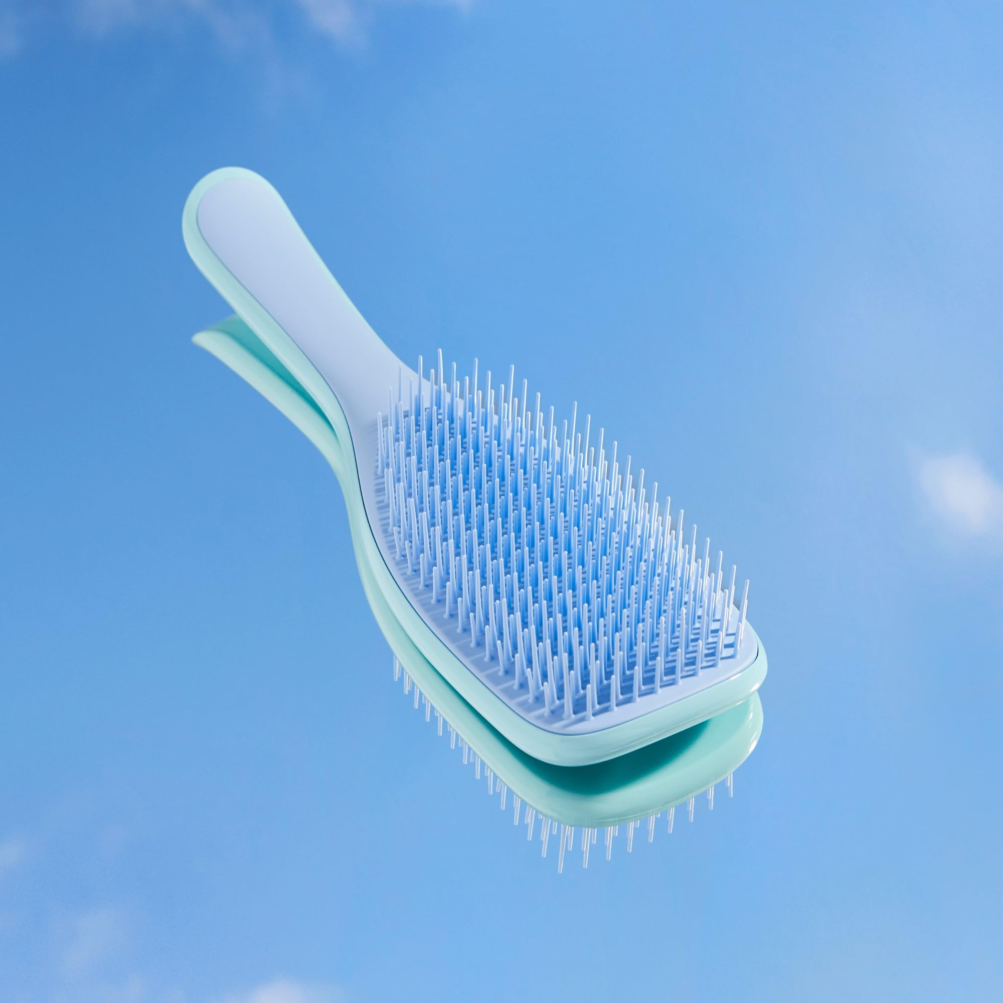Tangle Teezer Ultimate Detangler denim blues packaging transition in eco-friendly look