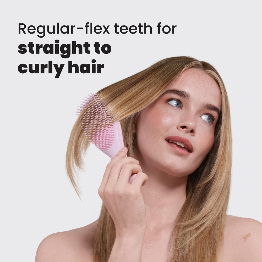 Tangle Teezer Ultimate Detangler with soft teeth reduces breakage while brushing