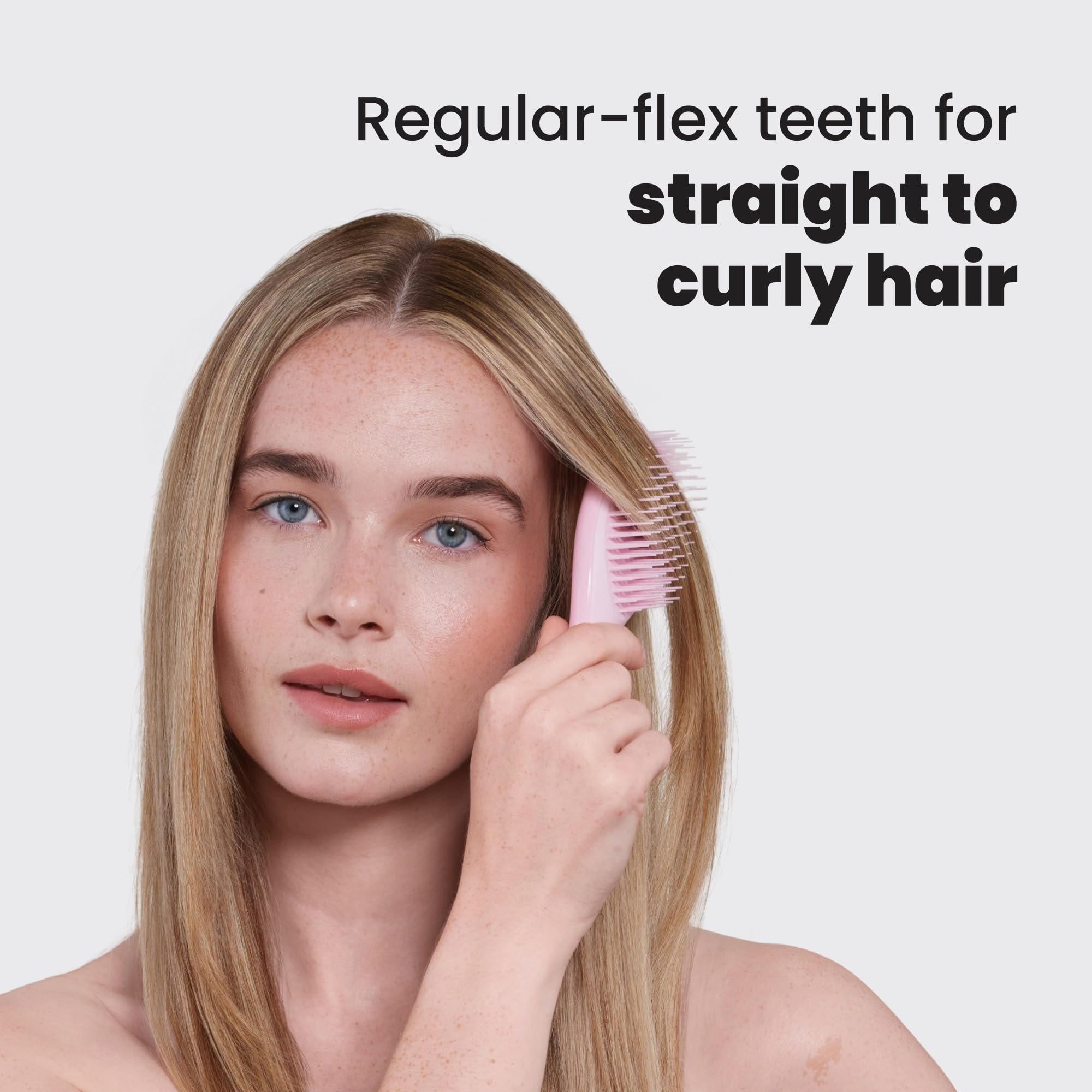 Detangles wet or dry hair with Tangle Teezer Ultimate Detangler using flexible teeth.