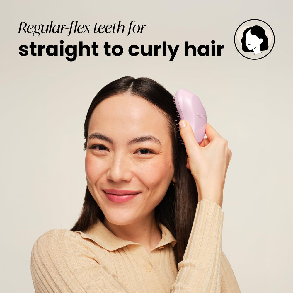 Tangle Teezer wet-dry detangler with two-tier teeth for smoother tangles.