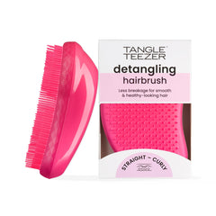 Tangle Teezer Original Detangler Brush eases knots with a gentle detangling glide.