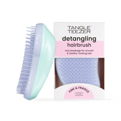 Tangle Teezer Original Detangler brush in mint violet color, smoothing color-treated hair.