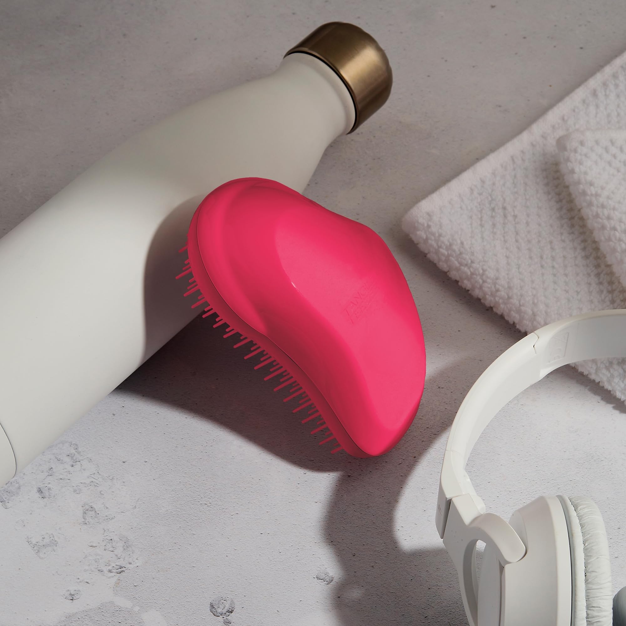 Tangle Teezer Original Palm-Sized design fits comfortably in hand for all hair types.