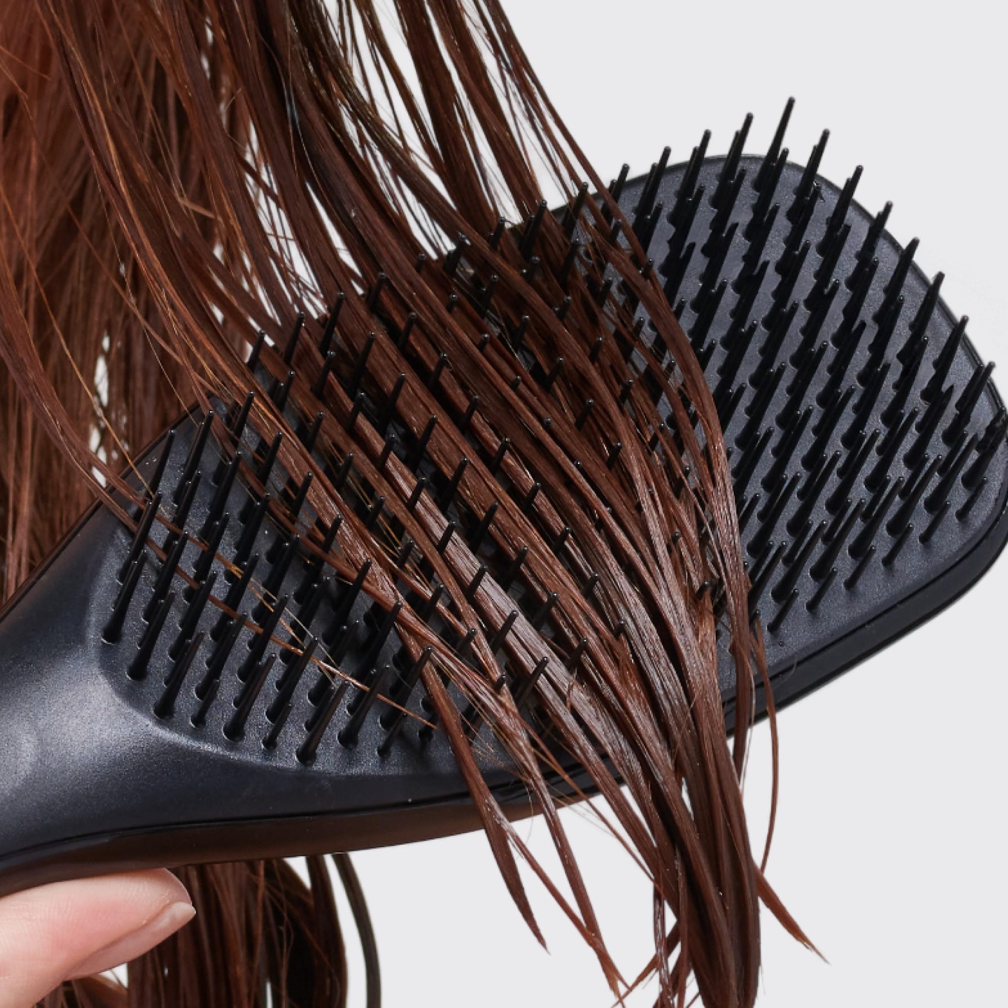 Tangle Teezer Ultimate Detangler enhances quick styling with smooth, frizz-free results.