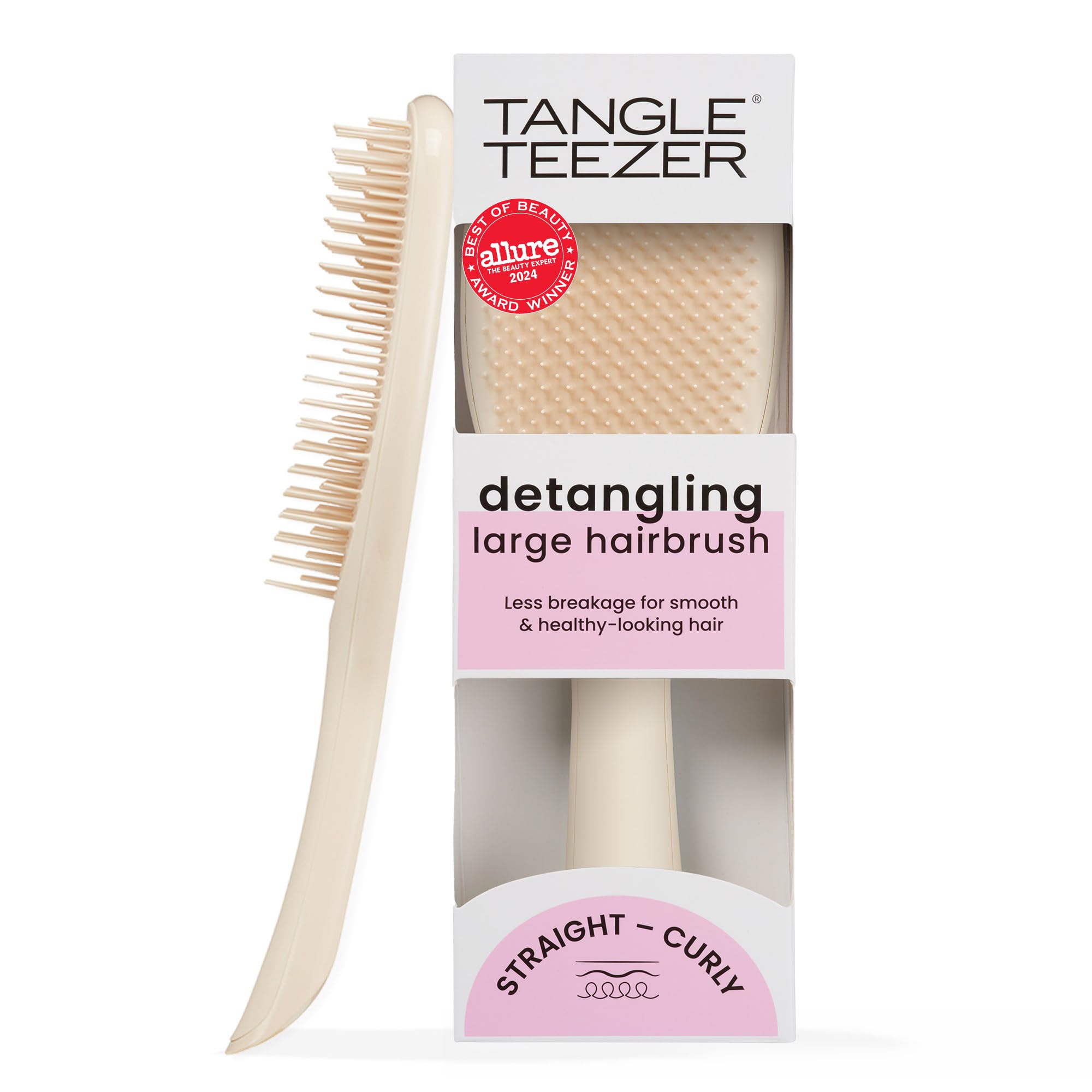 Tangle Teezer Ultimate Detangler with large paddle for gentle knot-free detangling on long hair.