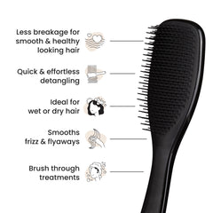 Tangle Teezer Ultimate Detangler with soft teeth safeguards scalp while smoothing strands.
