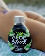 Tanning Paradise Aloe Black Lotion texture closeup shows creamy, luxurious hydration.