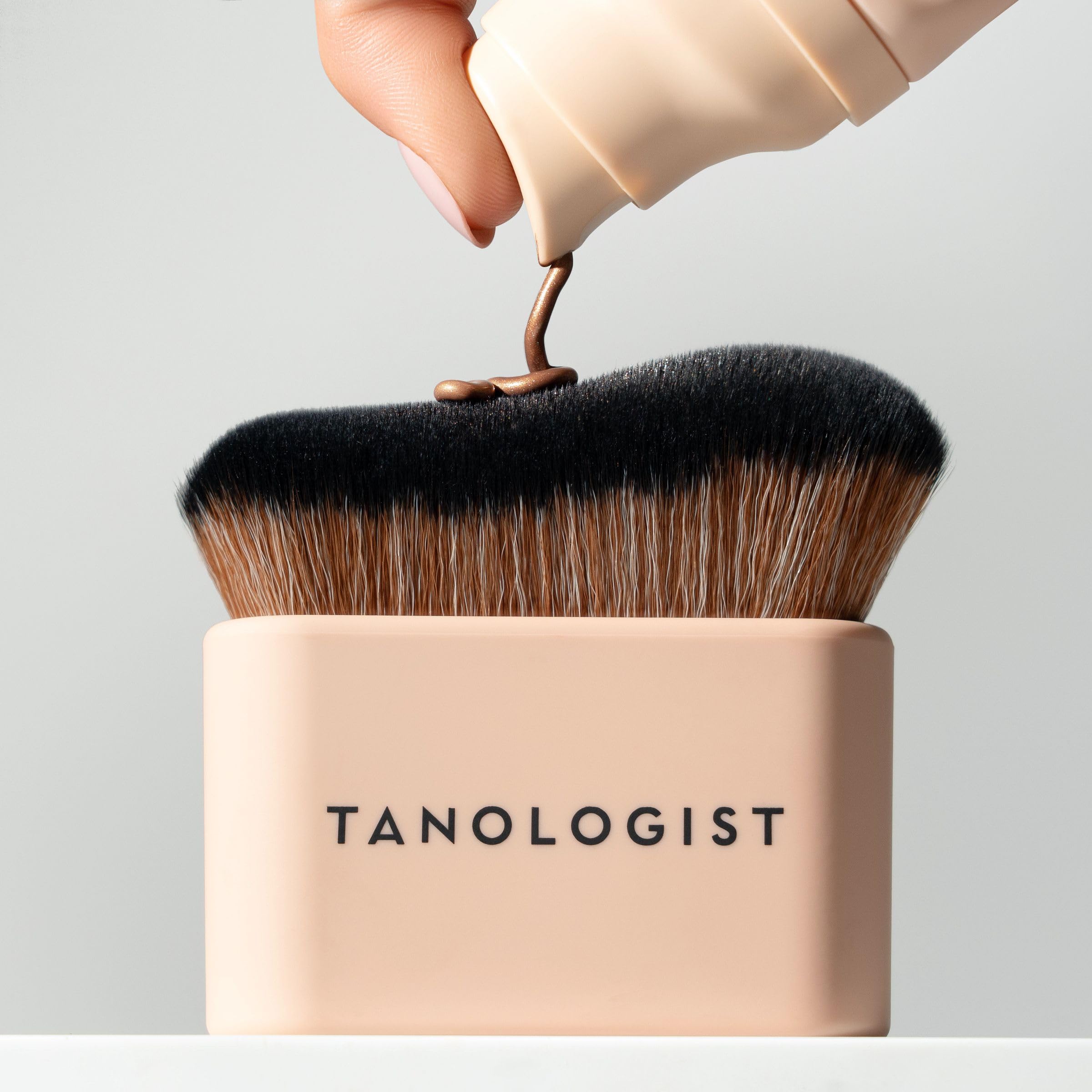 Tanologist Blending Brush works with mousse, water, and gradual tanners.