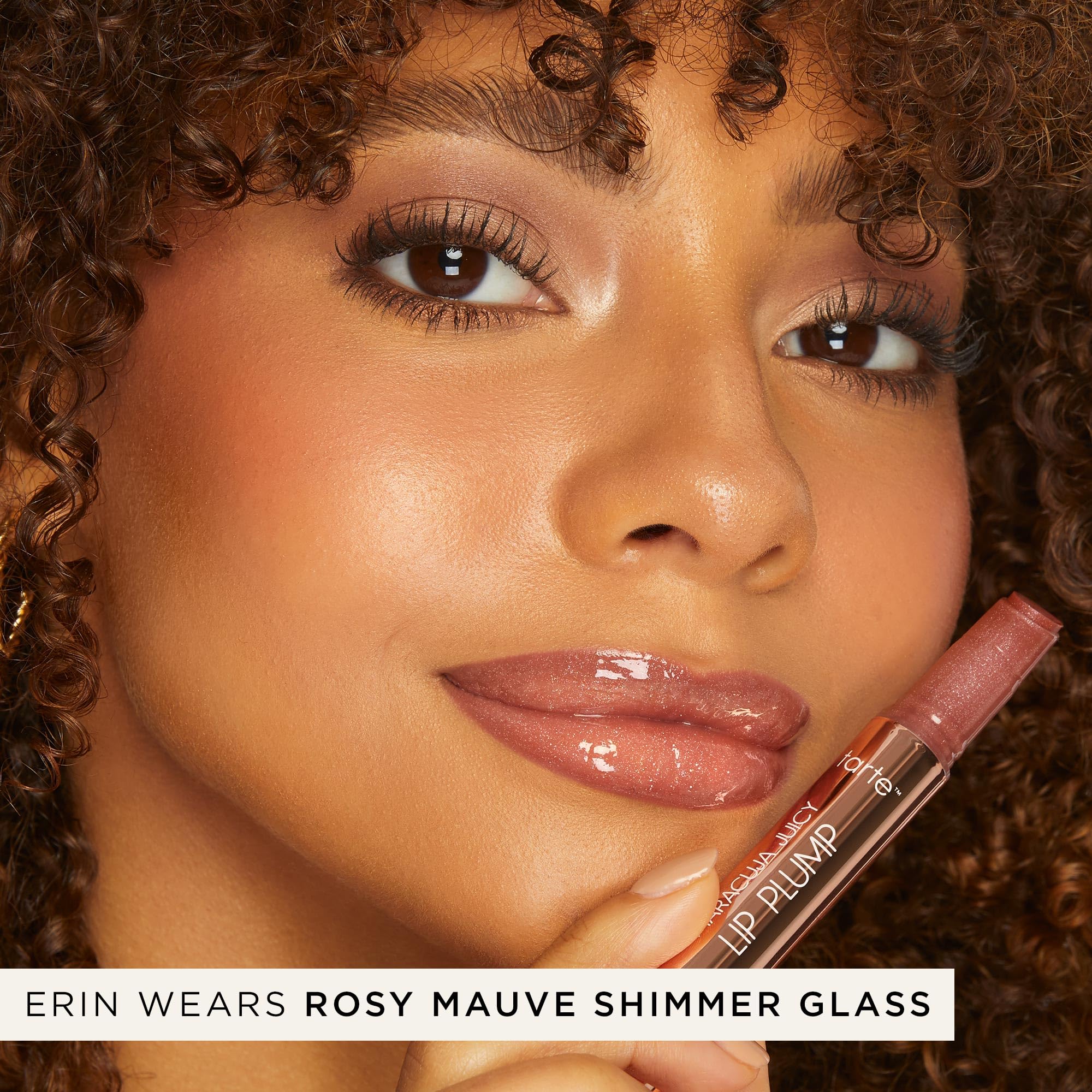 tarte maracuja juicy shimmer glass lip plump texture on lips looks creamy