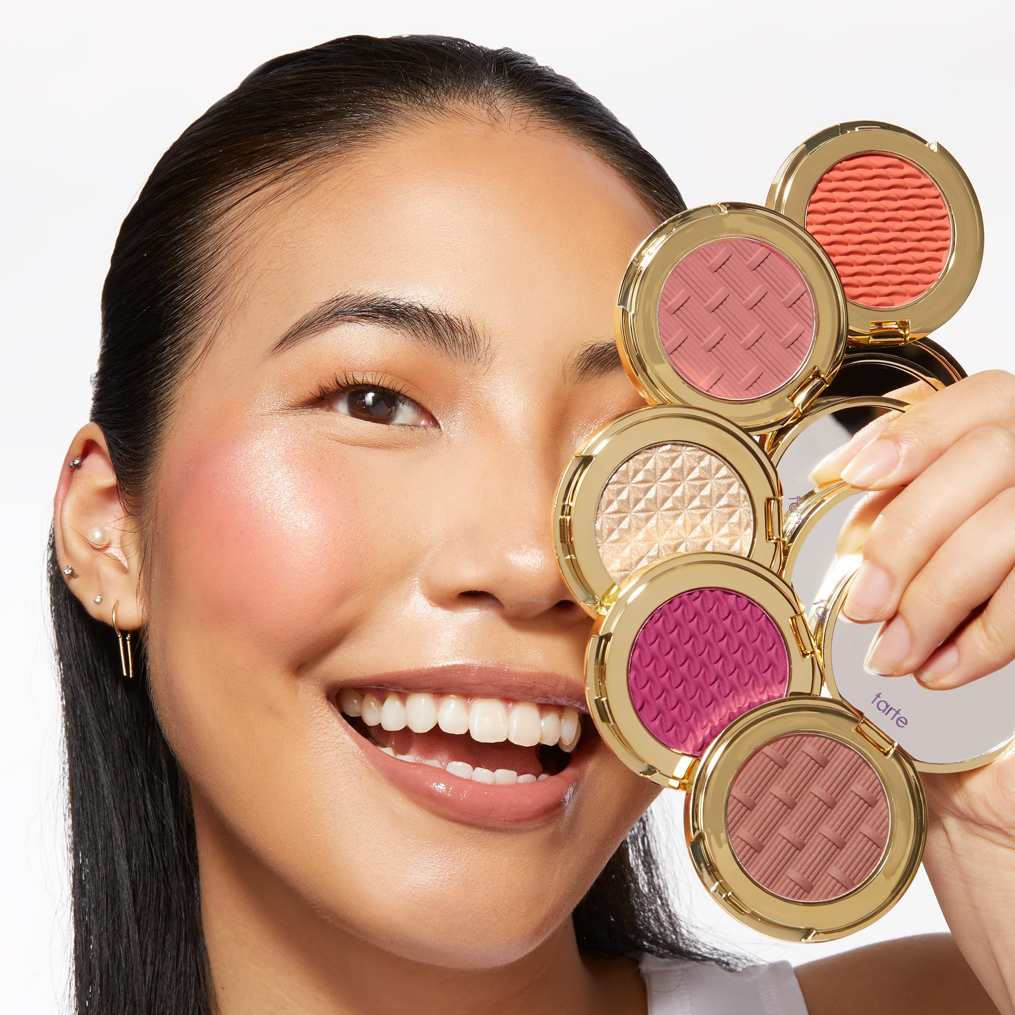 tarte Stay Golden champagne highlighter adds luminous glow on cheekbones