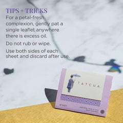 TATCHA blotting papers with 23 karat gold flakes impart a subtle glow.
