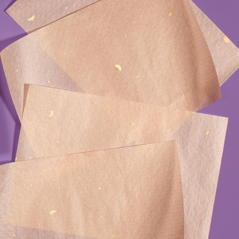 TATCHA packaging highlights ethical support for global education.
