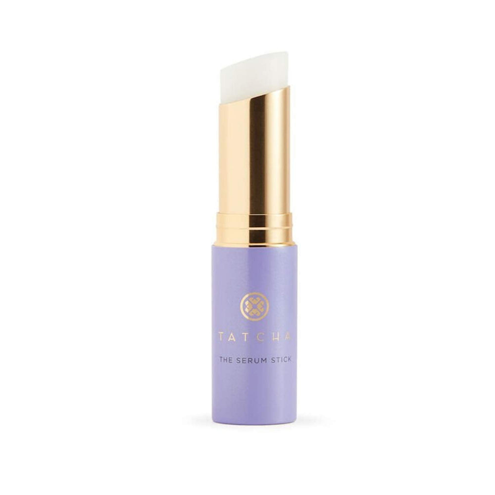 TATCHA The Serum Stick applied to the face for quick hydration and smoothing.