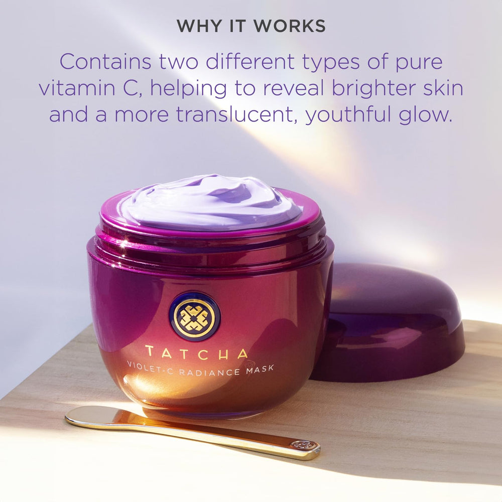 TATCHA Violet-C Mask being spread for even coverage during application.